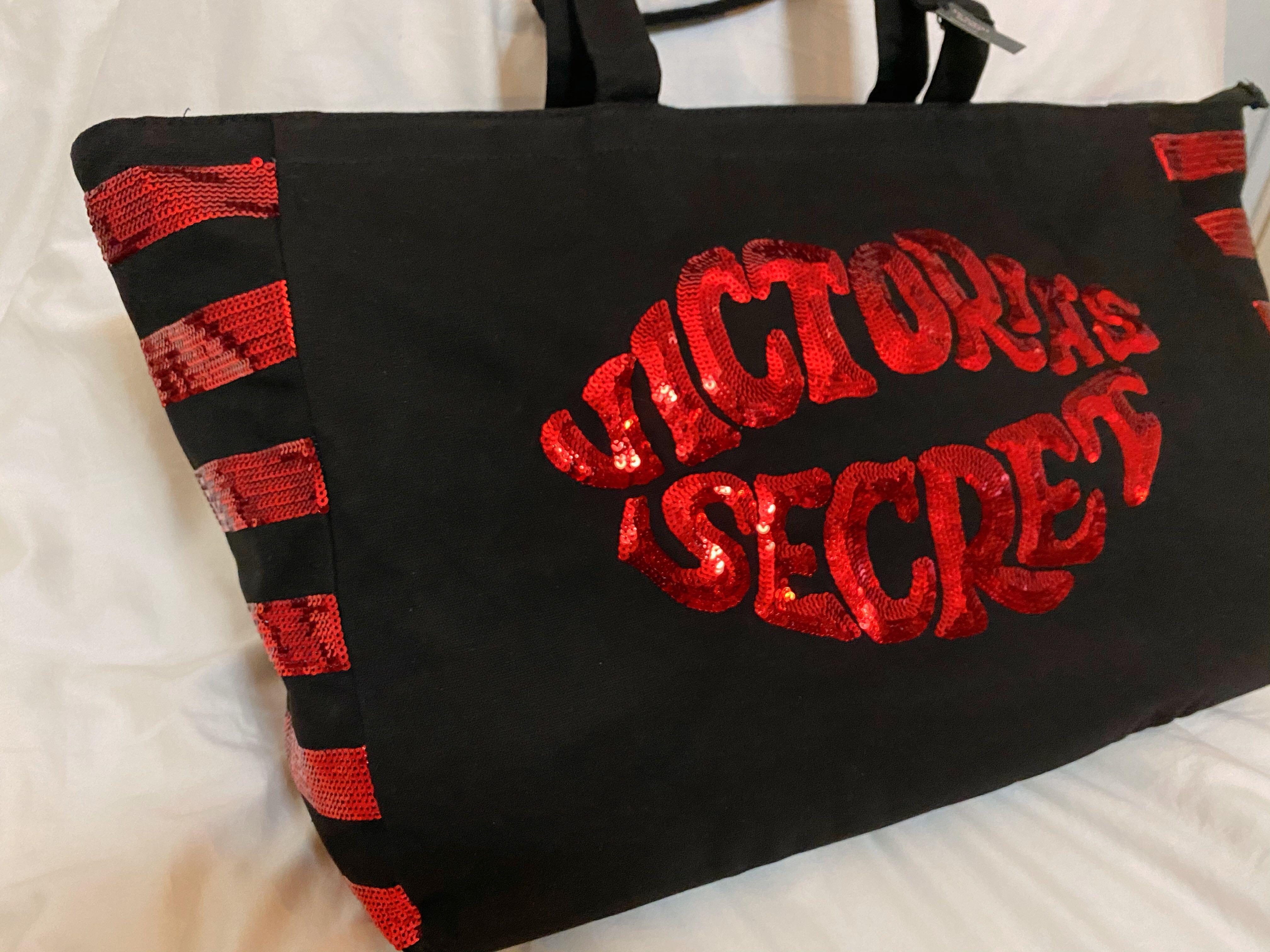 Victoria secret red store and black tote bag