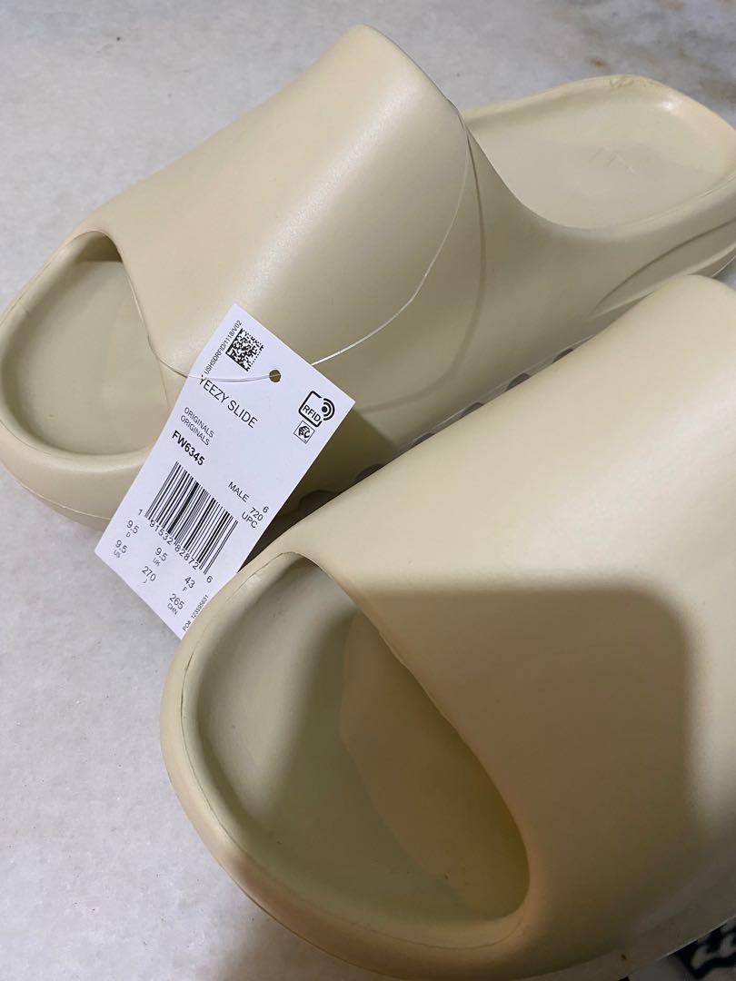 Yeezy Slides Bone White, Men's Fashion, Footwear, Flipflops and Slides on  Carousell