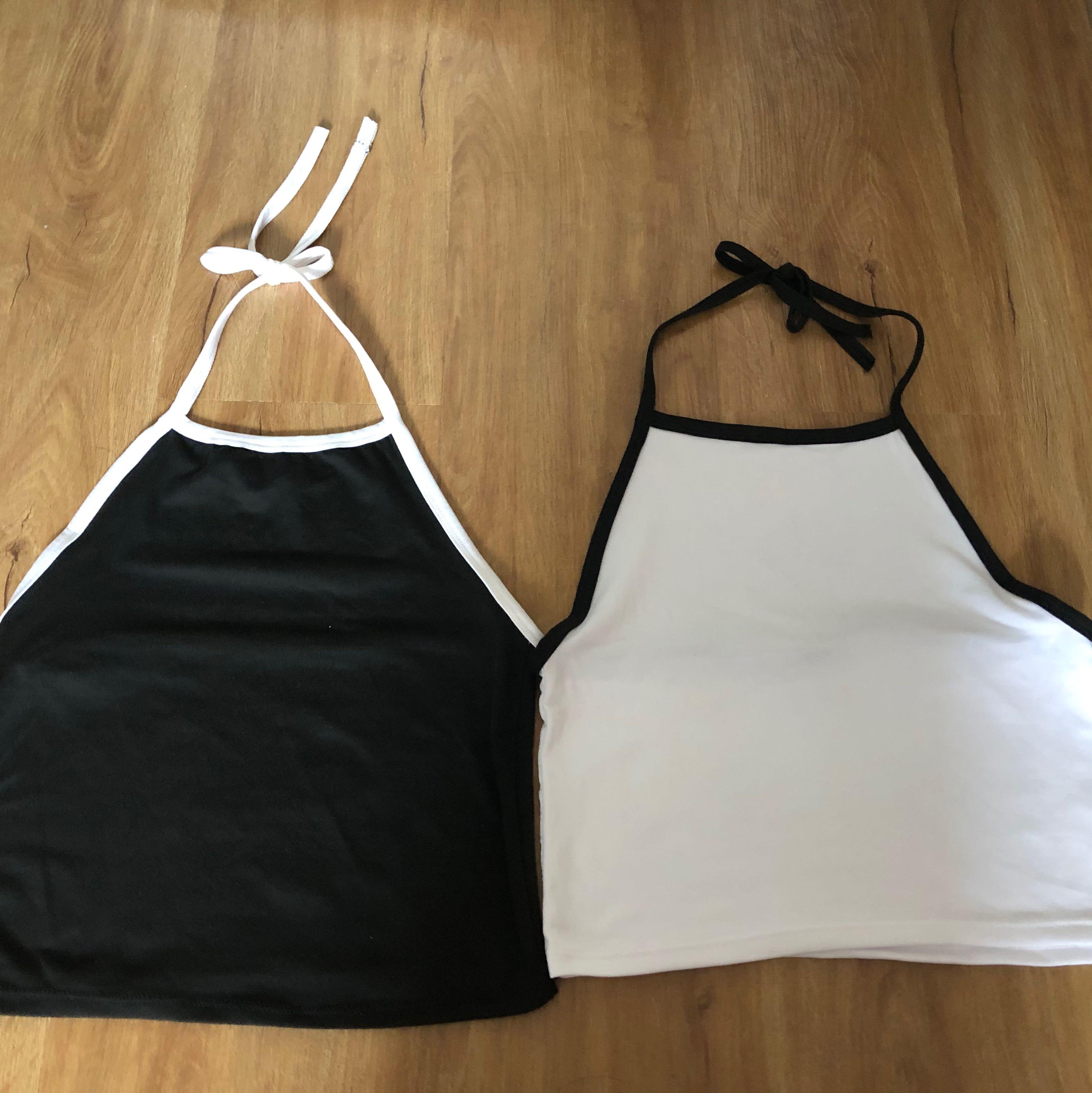 BLACK AND WHITE HALTER TOPS (Category: Sleeveless) located in Manila. Submitted by excess_stuff (Listing ID 1017657567, Image 1). Description: get both black and white halter tops for only 200 pesos! .