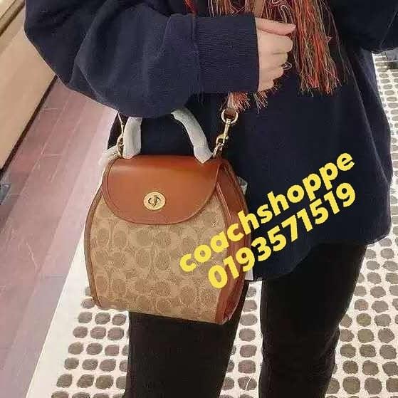 Turnlock curved best sale top handle crossbody