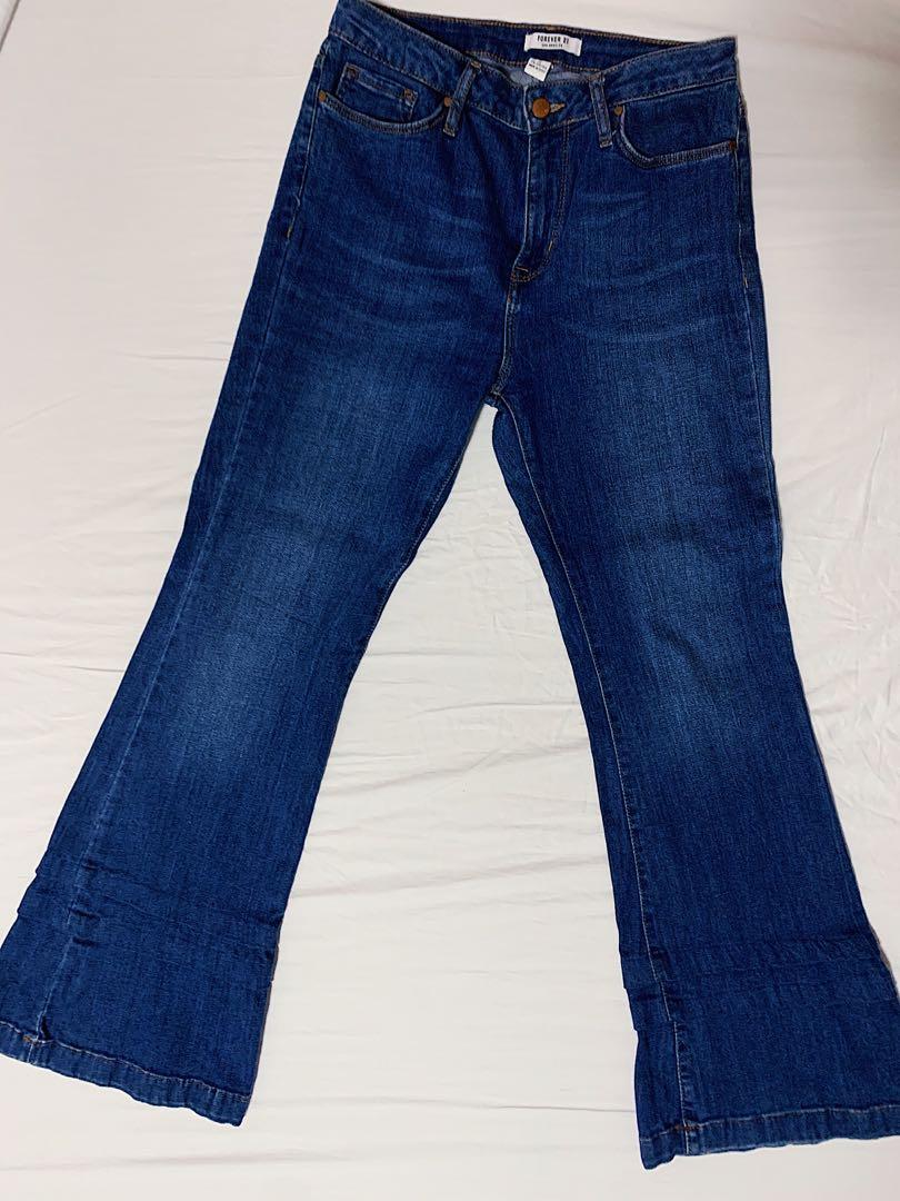 pleated blue jeans
