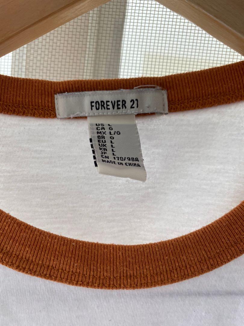 Forever 21 Shirt (Category: Shirts) located in San Juan City. Submitted by angesioson (Listing ID 1017705668, Image 3). Description: ❤️❤️❤️ - Pre-loved but still in good condition - Fits M-L frames (Fits S too but a bigger/looser fit) - RFS: Not my style anymore - No flaws ❤️❤️❤️.