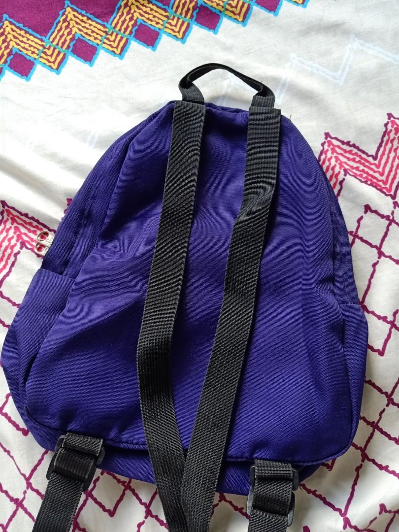 JanSport Half Pint Backpack (Category: Backpacks) located in Pasig City. Submitted by kanello (Listing ID 1017679682, Image 2). Description: JanSport Half Pint Backpack 💯 Authentic, preloved Color: Violet Size: indicated in the pics Length: 12" Width: 10.5-11" - adjustable shoulder straps - perfect for kids! (pwede rin sa adult para cute) - in good condition pa, lalabhan lang and polish sa zipper handle 😊.