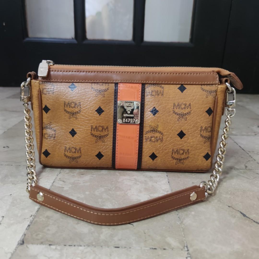 MCM Pochette Bag, Luxury, Bags & Wallets on Carousell