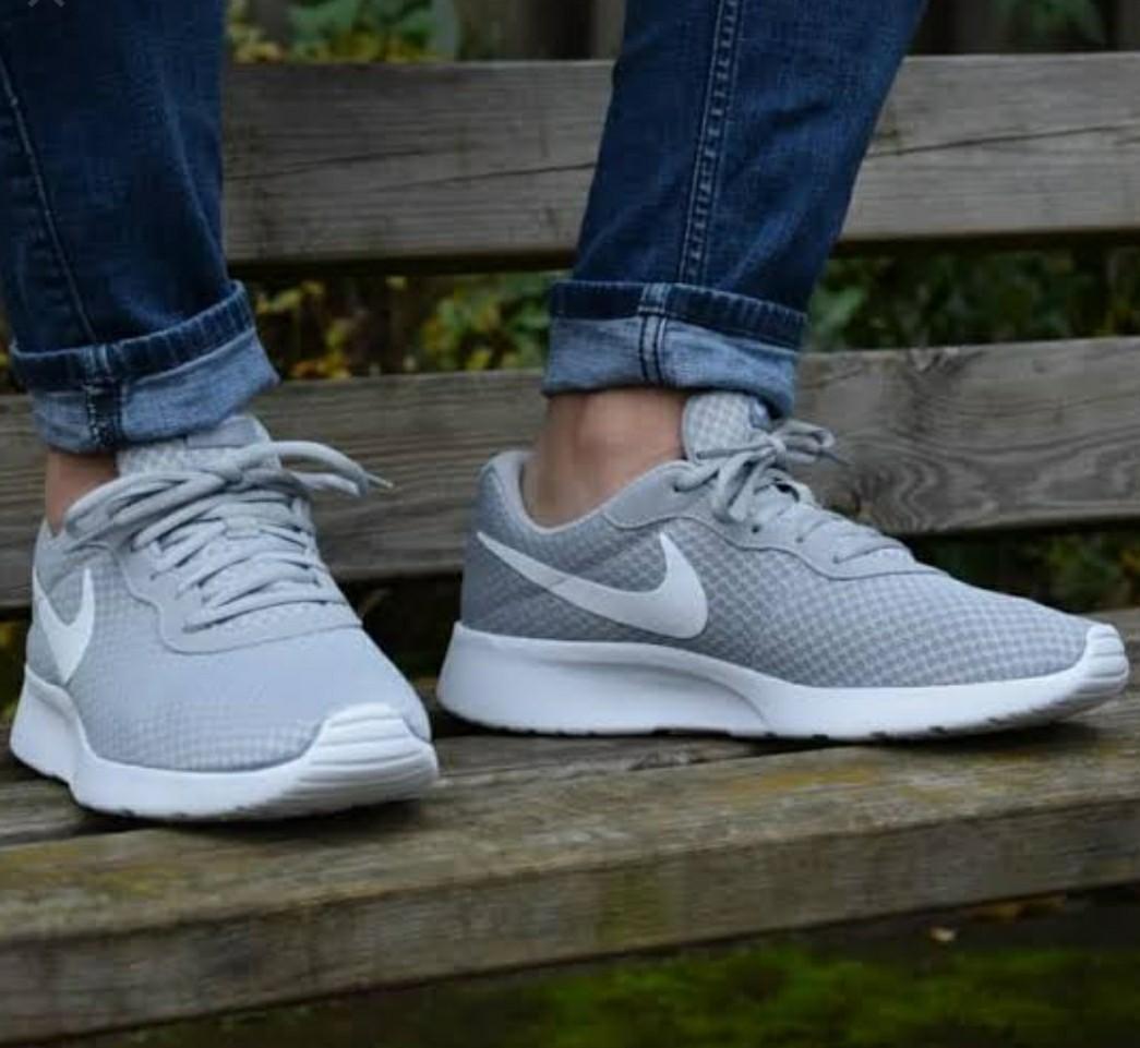 Nike tanjun deals with jeans