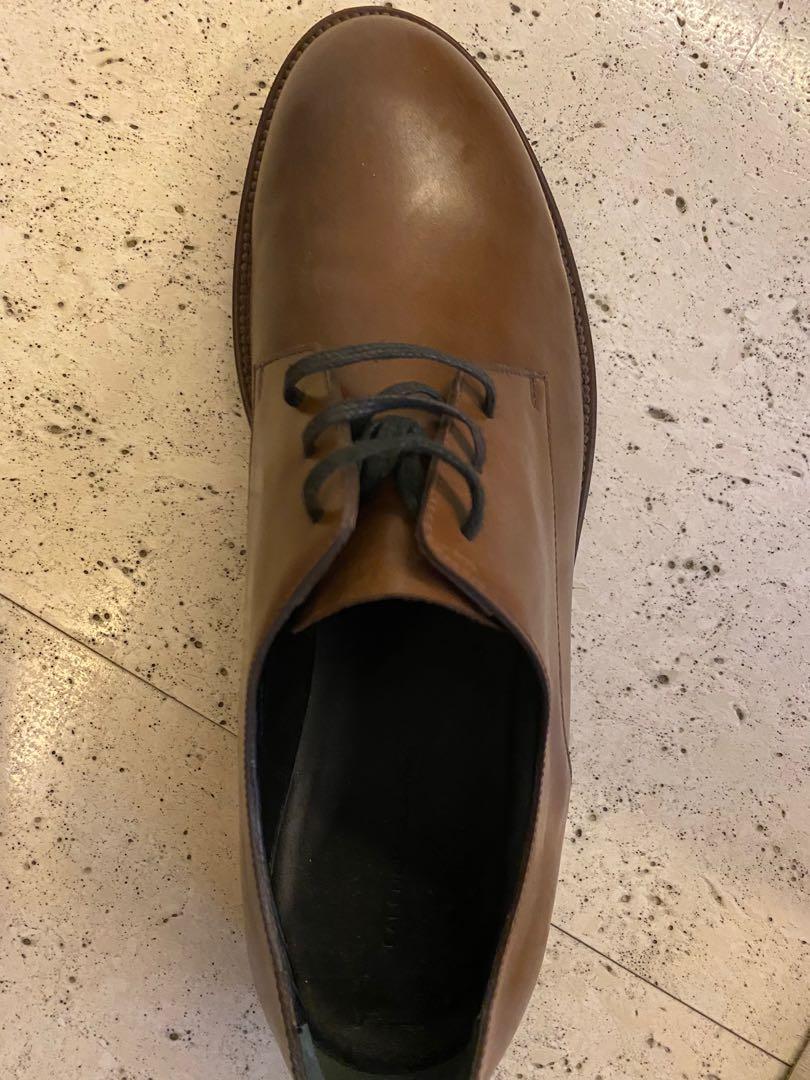 Balenciaga Brown Leather Shoes (Category: Dress Shoes) located in Pasig City. Submitted by saxmax (Listing ID 1022219508, Image 2). Description: Brown leather shoes with red soles. Used. P4,000.00 + SF.