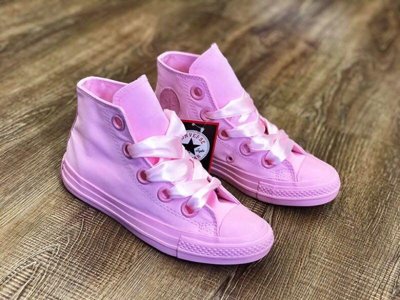 pink converse with fur