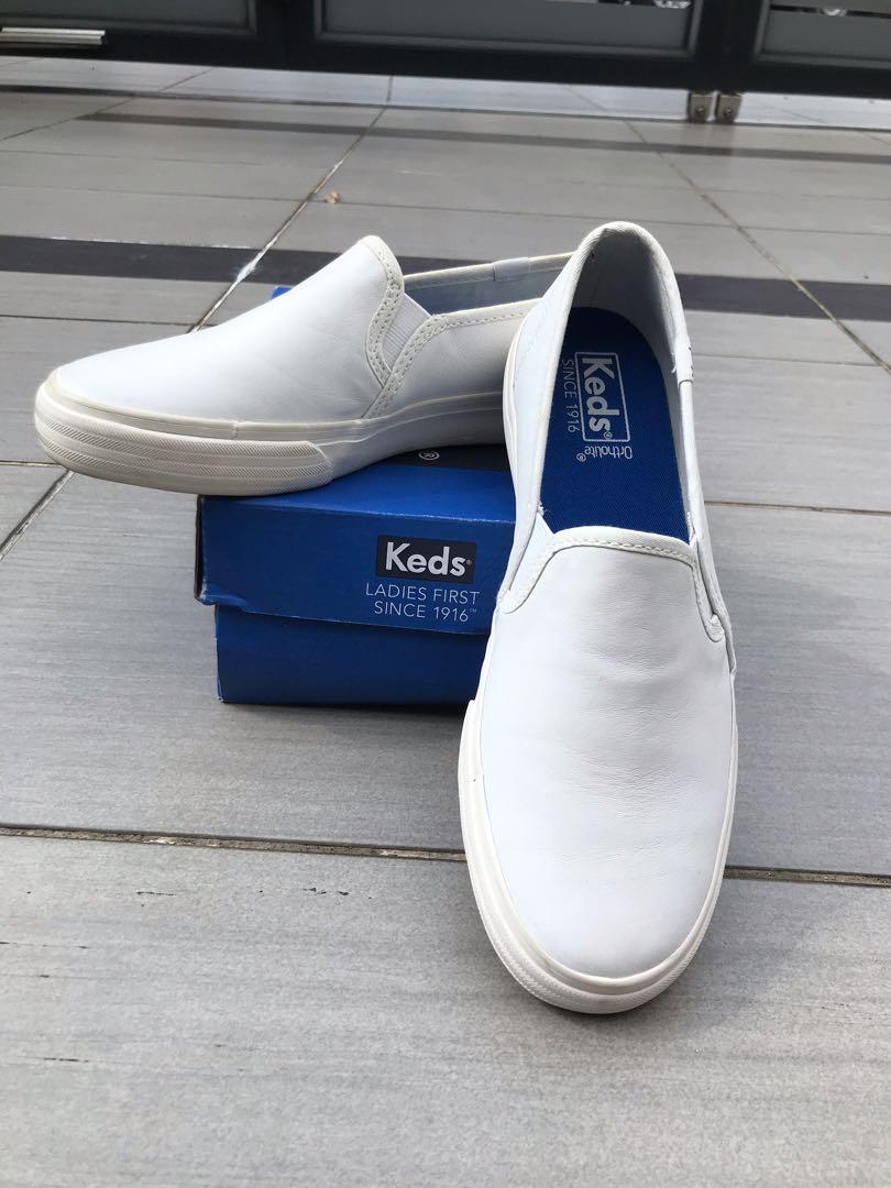 white leather slip on keds