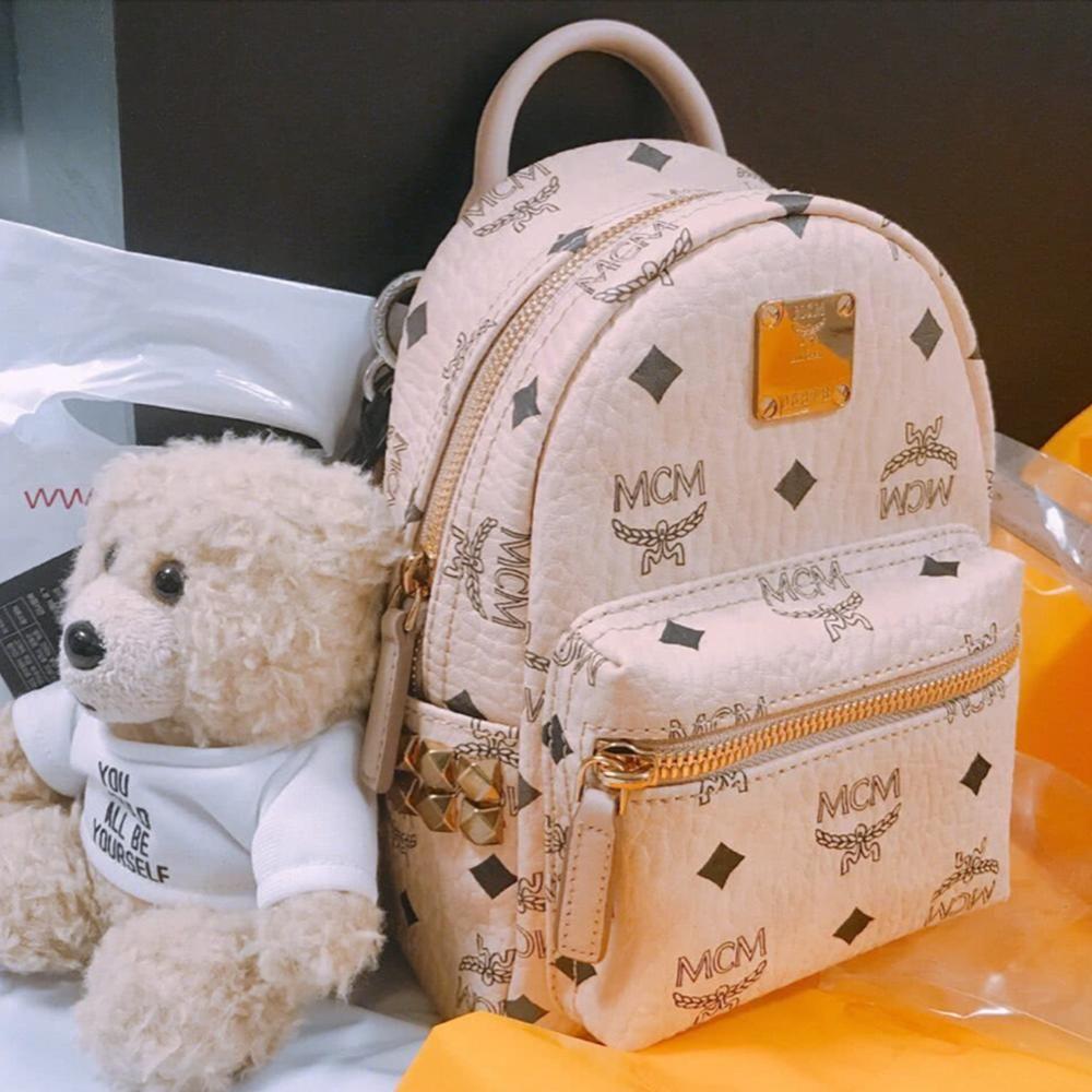 Mcm purse cheap backpack