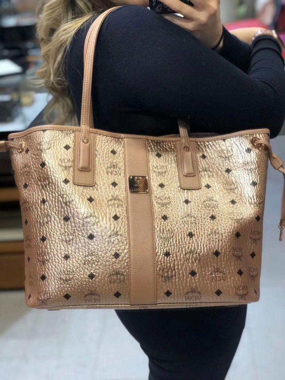 Champagne mcm hotsell bag