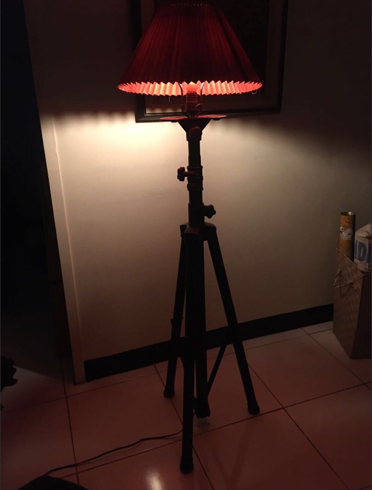 red tripod floor lamp