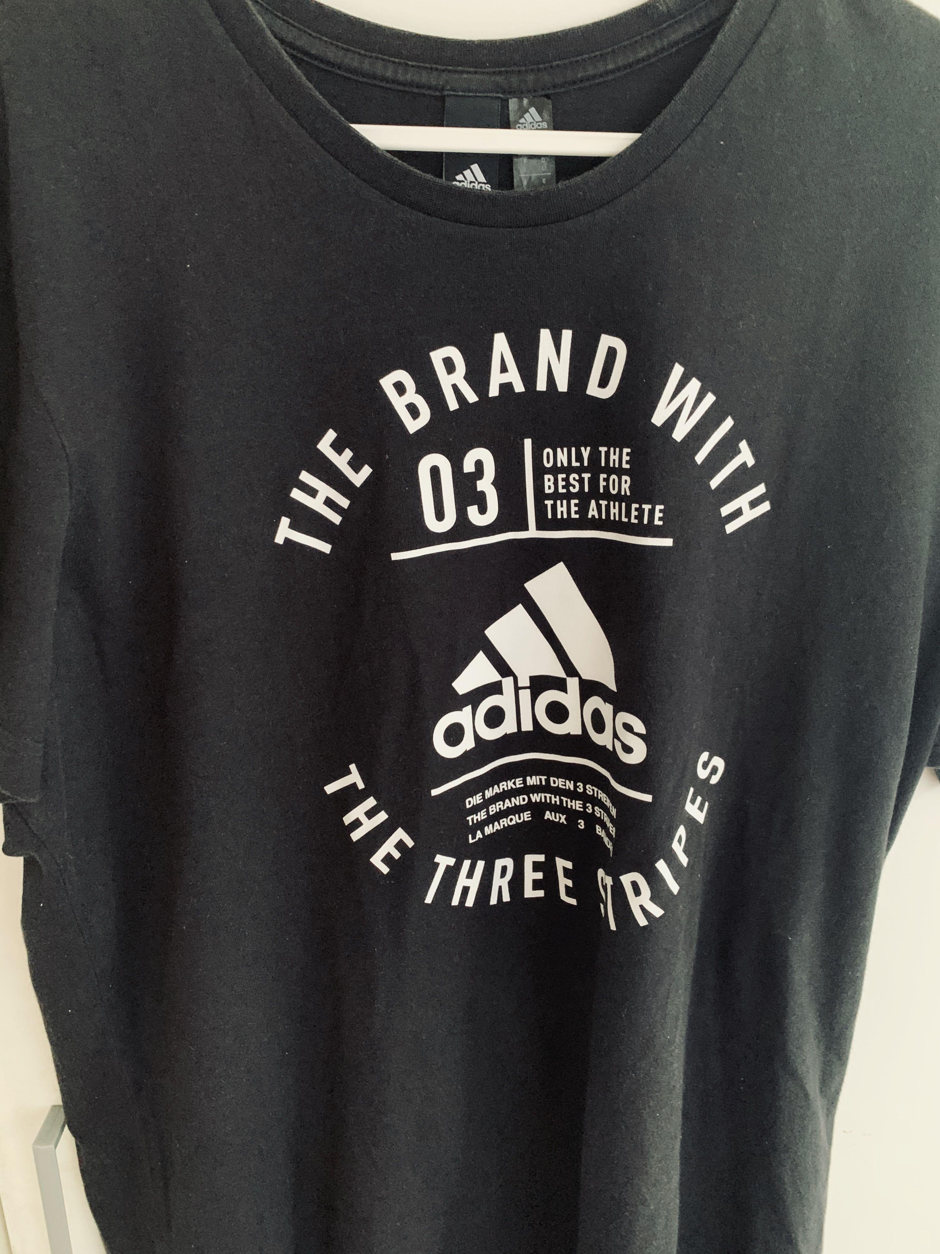 adidas the brand with the 3 stripes shirt