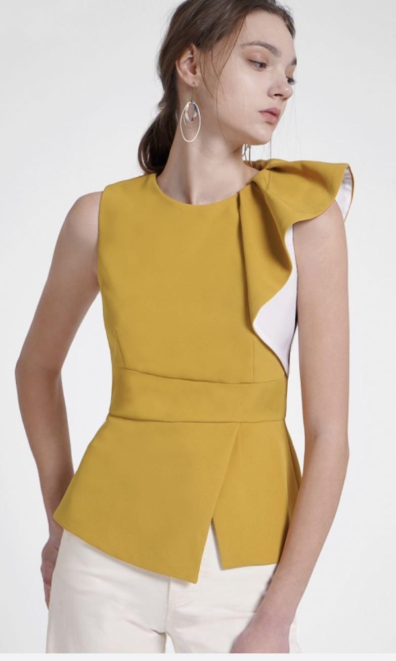 sleeveless top with ruffles