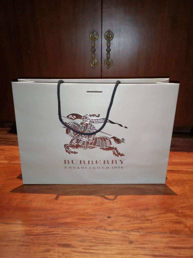 Burberry paper bags (Category: Luxury Bags & Wallets) located in San Juan City. Submitted by super.saver8 (Listing ID 1022612931, Image 3). Description: 2 sizes for bag - 42x30cm - sold out for shoes - 35x27cm.
