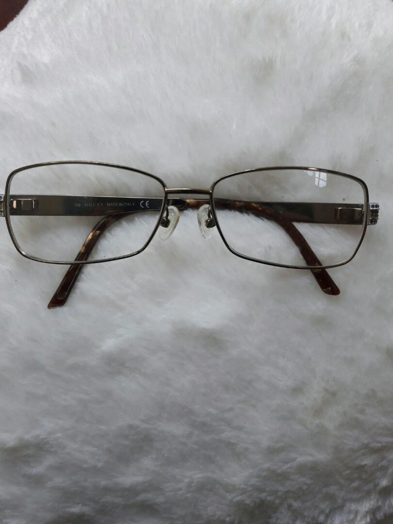 gucci eyeglasses on face