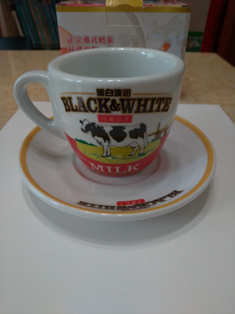 Teacup set - Black&White's Evaporated Full Cream Milk .