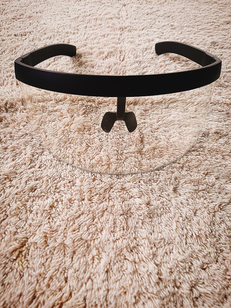 PROMO - Free Pouch Eye Shield Half Face Protection (Category: Sunglasses & Eyewear) located in Mandaluyong City. Submitted by eye_armour (Listing ID 1022763216, Image 2). Description: Protect yourself in style! Hi! This color combination design is called Shadow clear of Shadow series (Black frame). I have 9 designs available. These are on-hand and ready for purchase. The frame is made up of thick plastic and the lens is clear acrylic. Unlike a fa