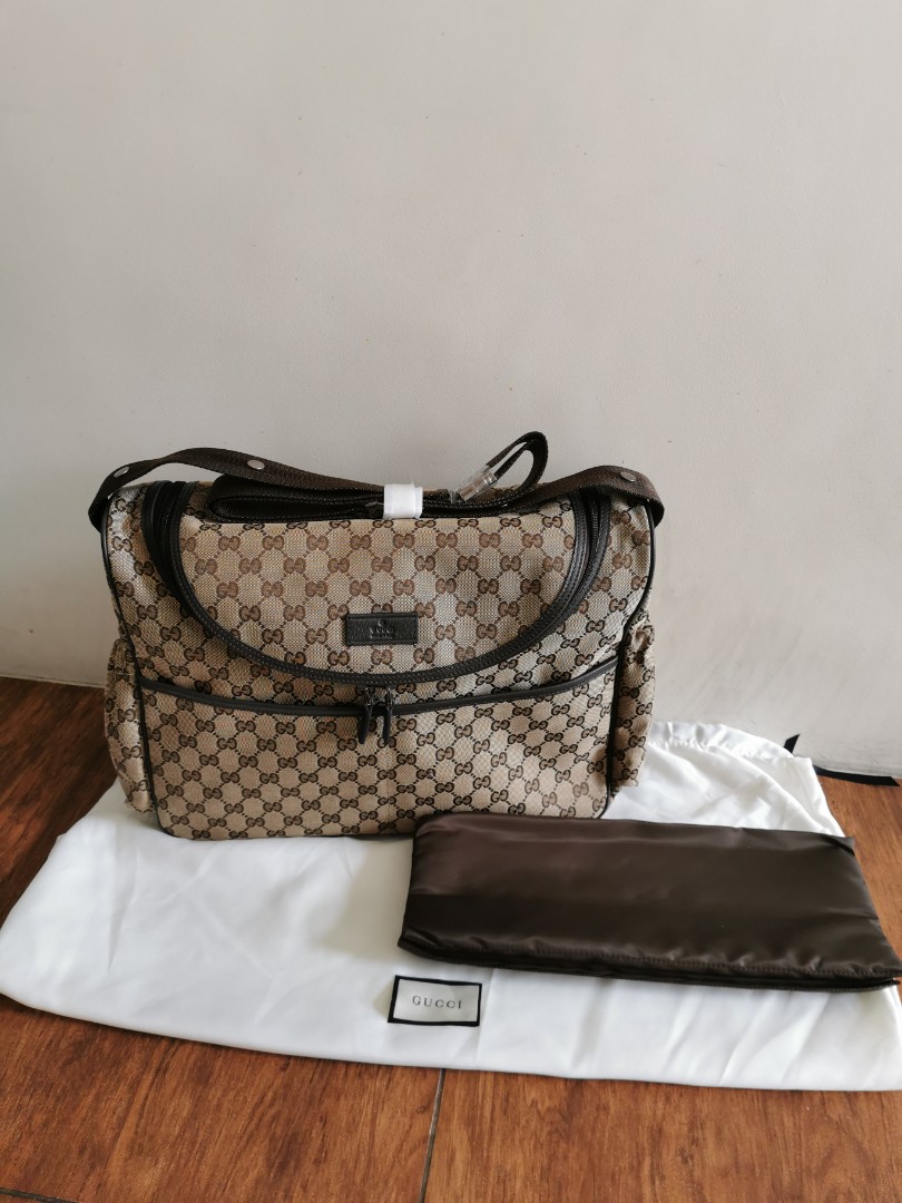 Used gucci diaper bag deals