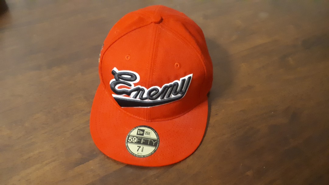 Supreme × Public Enemy New Era Size 7 3/8, Men's Fashion, Watches   Accessories, Cap  Hats on Carousell
