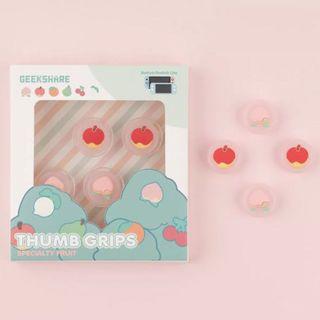 Animal Crossing peaches and apple thumb grips for nintendo switch