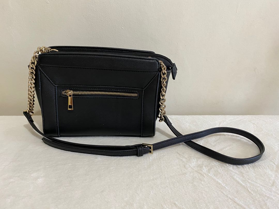 black sling bag with gold chain