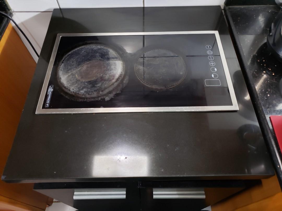 Induction Stove (Category: Hobs & Hoods) located in Pasig City. Submitted by alittleless (Listing ID 1023028981, Image 1). Description: brand: la germania L 59cm W 59 H 86cm granite countertop (1 inch thick) condiments and other materials inside not included.