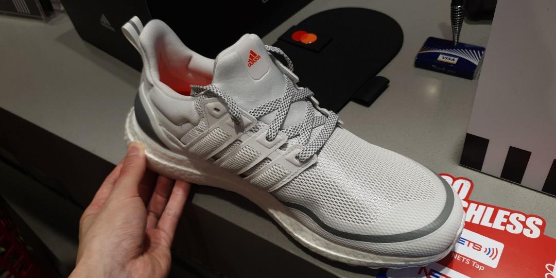 ultra boost white reflective on feet