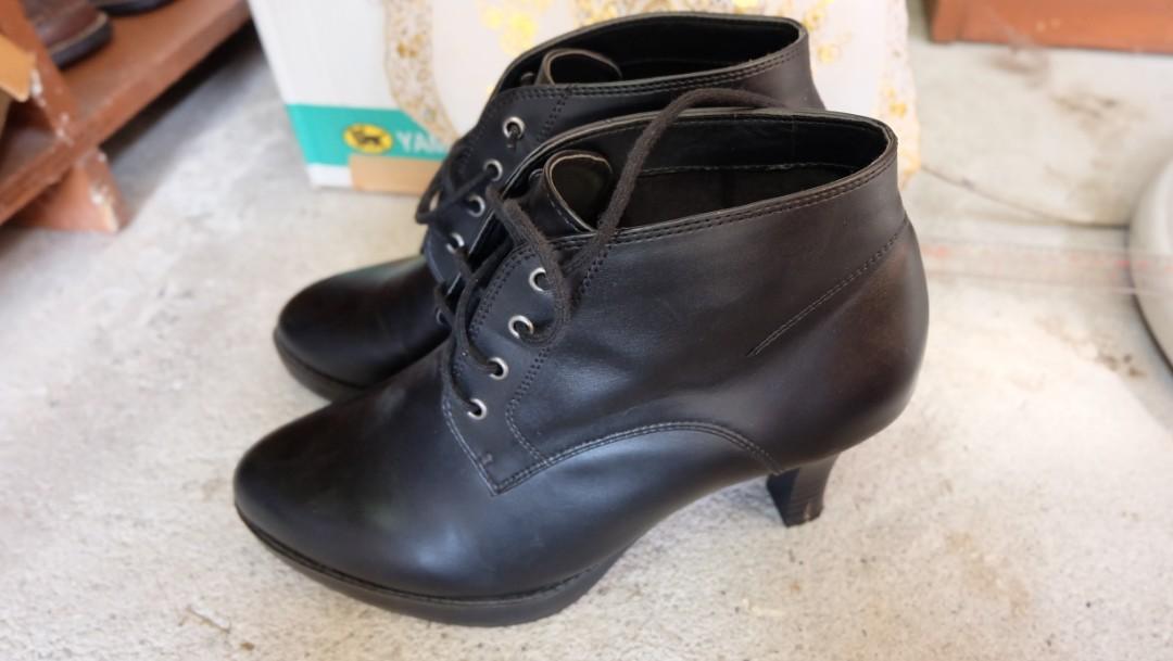 black leather shoe boot