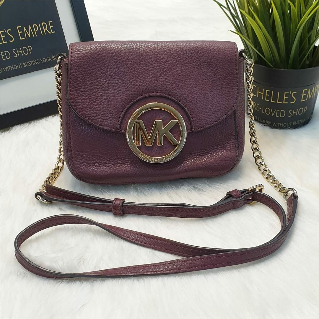 michael kors round sling bag