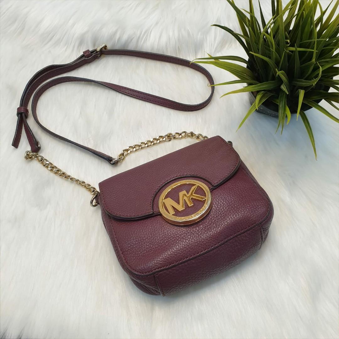 michael kors round sling bag