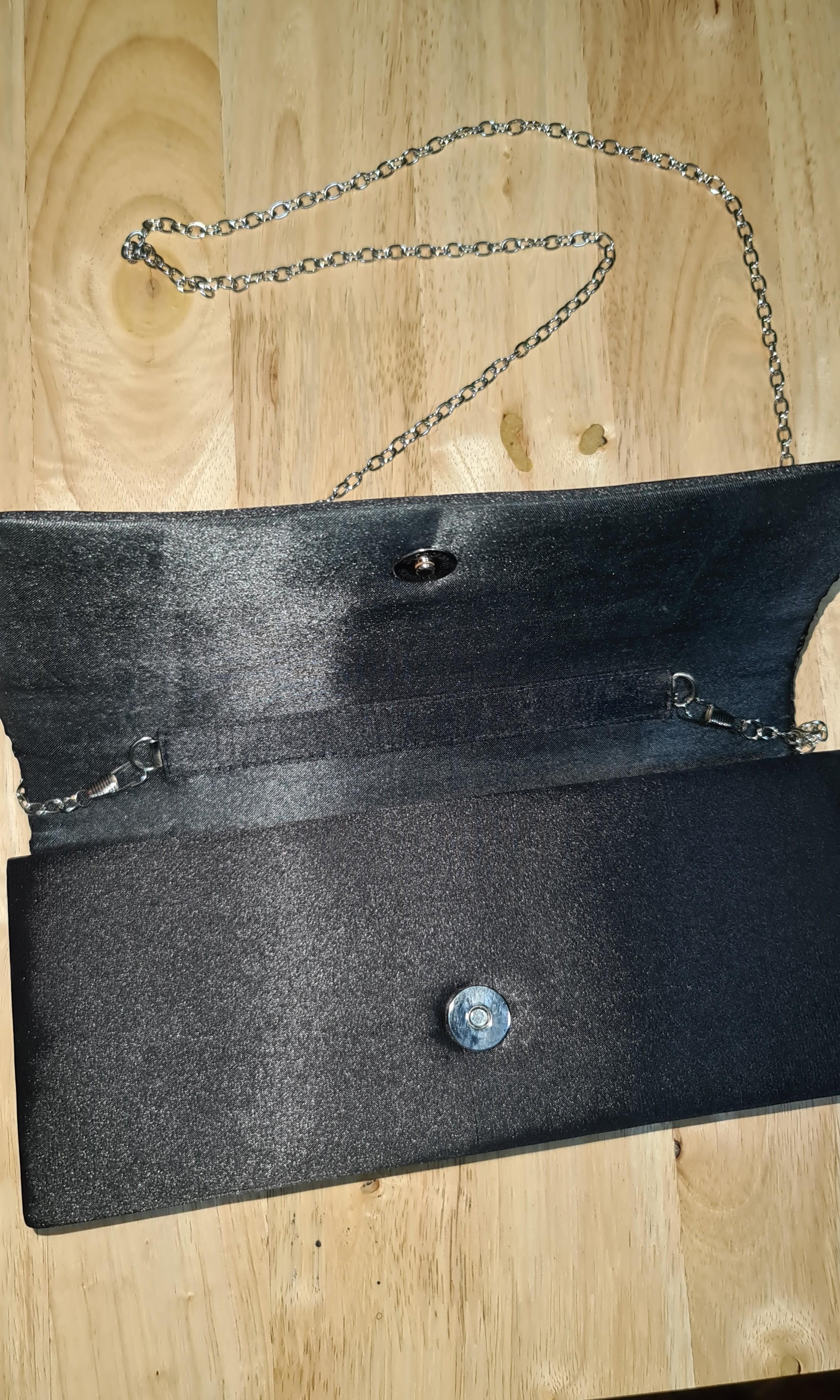 Black satin handbag / sling bag (Category: Tote Bags) located in Mandaluyong City. Submitted by kmfad (Listing ID 1023615369, Image 3). Description: .