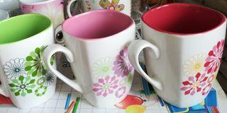 Four  Mugs With Floral Patterns