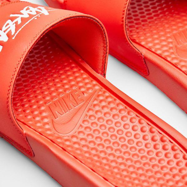 orange nike benassi slides