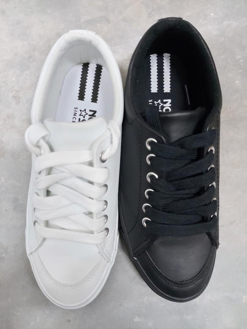 white and black school shoes