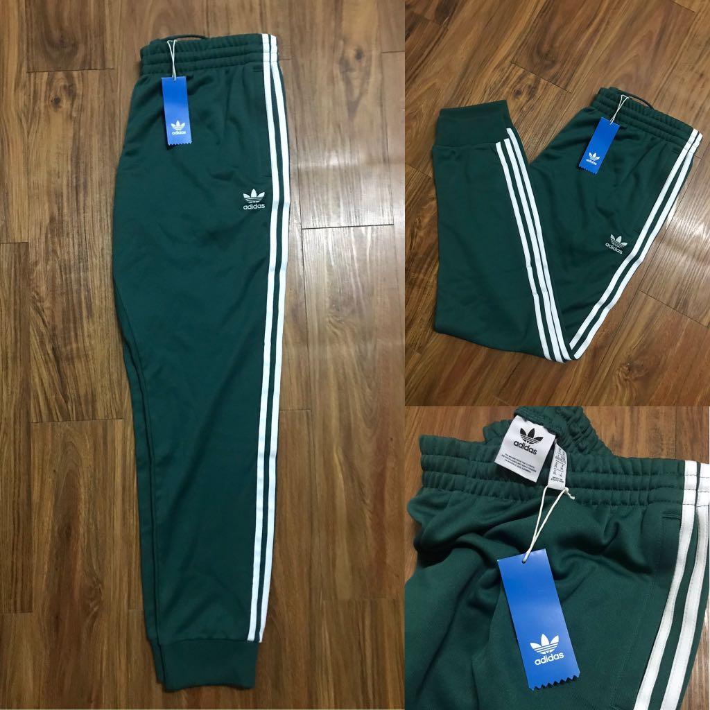 teal adidas tracksuit