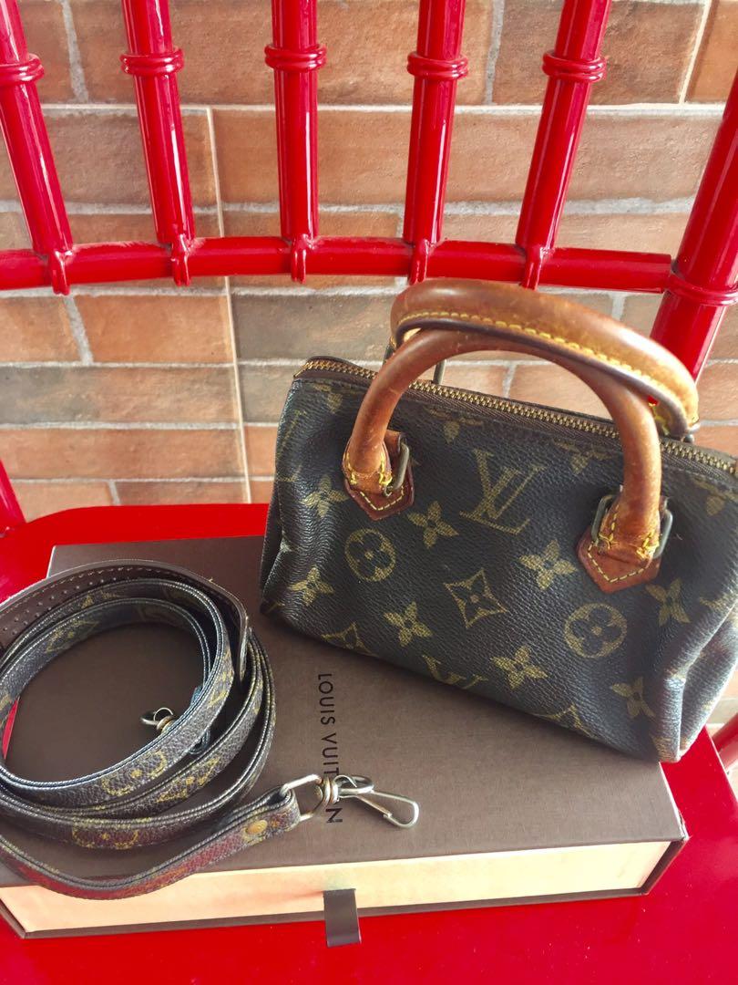 Authentic LV mIni Speedy with sling (Category: Luxury Bags & Wallets) located in Paranaque City. Submitted by french21closet (Listing ID 1023802559, Image 3). Description: Authentic LV Monogram vintage mini speedy with LV strap in good condition With signs of wear as seen in the photos/handle is already dark but no cracks, no bad smell , bag is still clean inside “Please expect signs of usage and manage your expectations” For serious takers only 