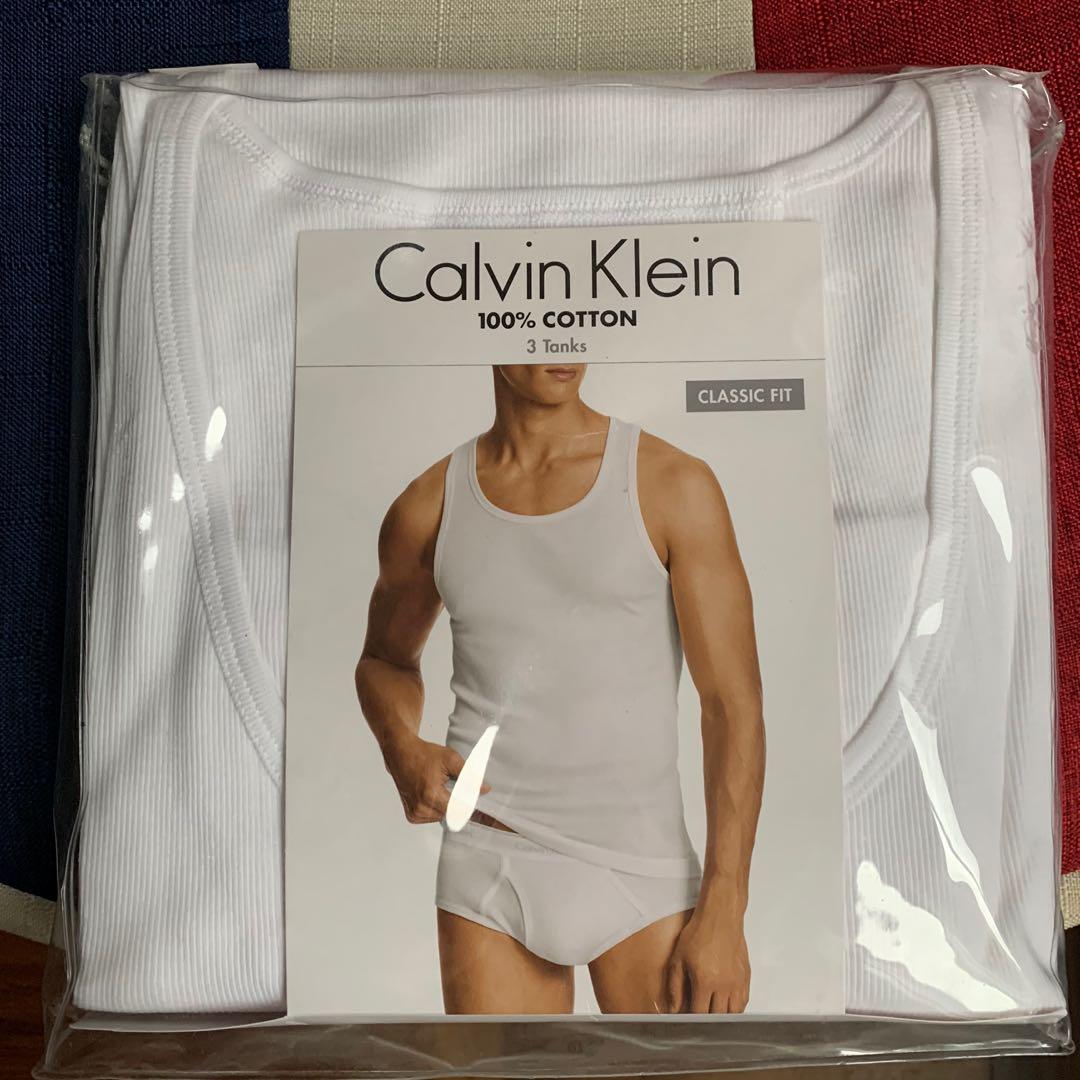 Calvin Klein Tank Top White (3 pcs), Men's Fashion, Tops & Sets, Formal  Shirts on Carousell