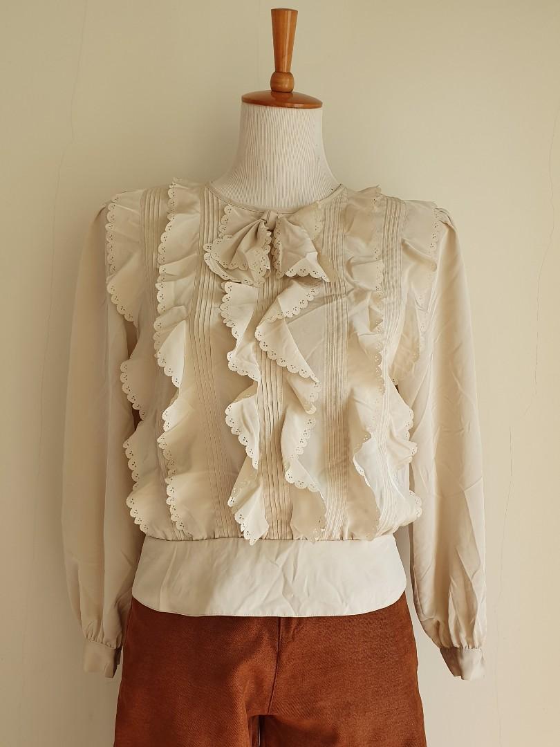 beige ruffle blouse