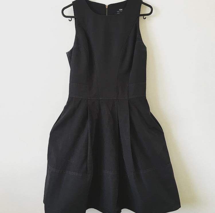 Cue black dress