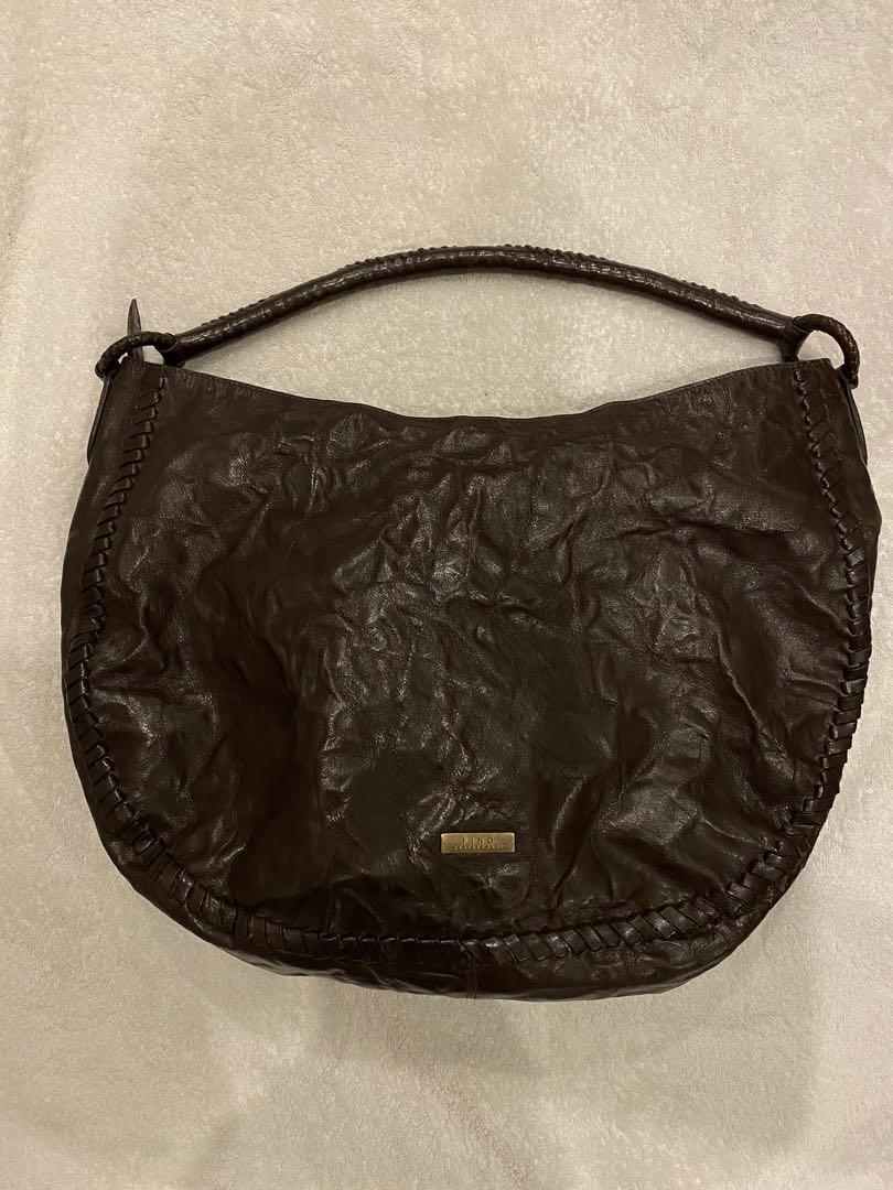 Fino leather bag (Category: Luxury Bags & Wallets) located in Pasig City. Submitted by closetqueen8888 (Listing ID 1024140132, Image 1). Description: Fino genuine leather shoulder bag Color: Dark Brown No Flaws Like new Used once Price: 9,000 Buyer shoulders shipping fee.