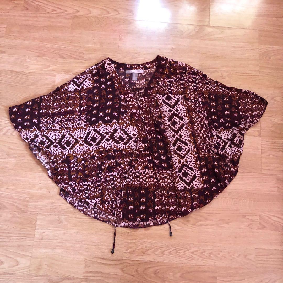 Forever 21 Graphic Poncho Top (Category: Others Tops) located in Las Pinas. Submitted by shopmarie (Listing ID 1024144571, Image 1). Description: .