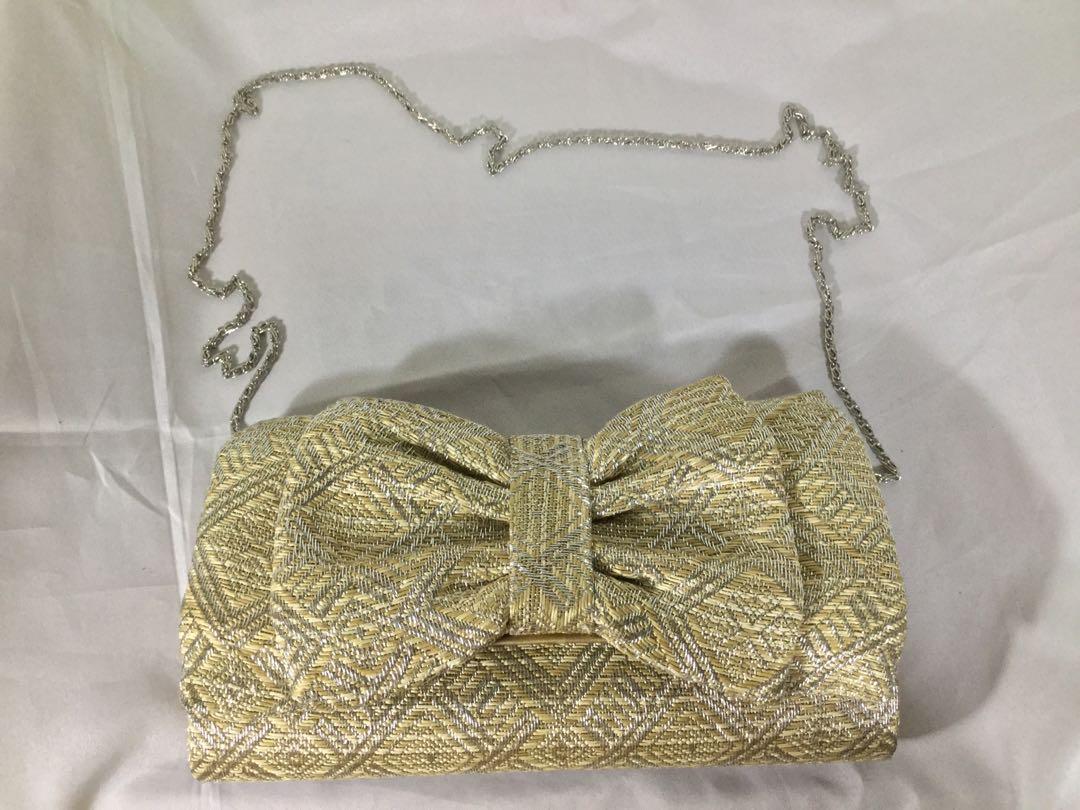Metallic Bow Handle Clutch