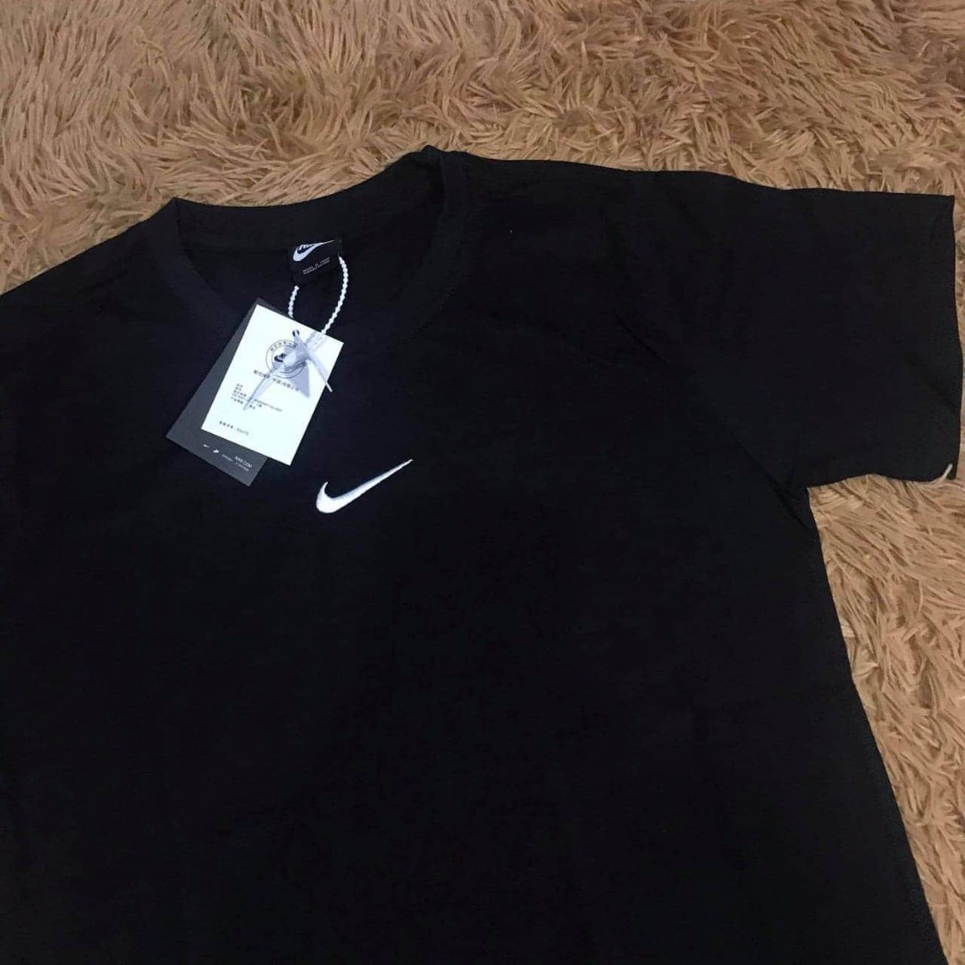 nike tee with swoosh in the middle
