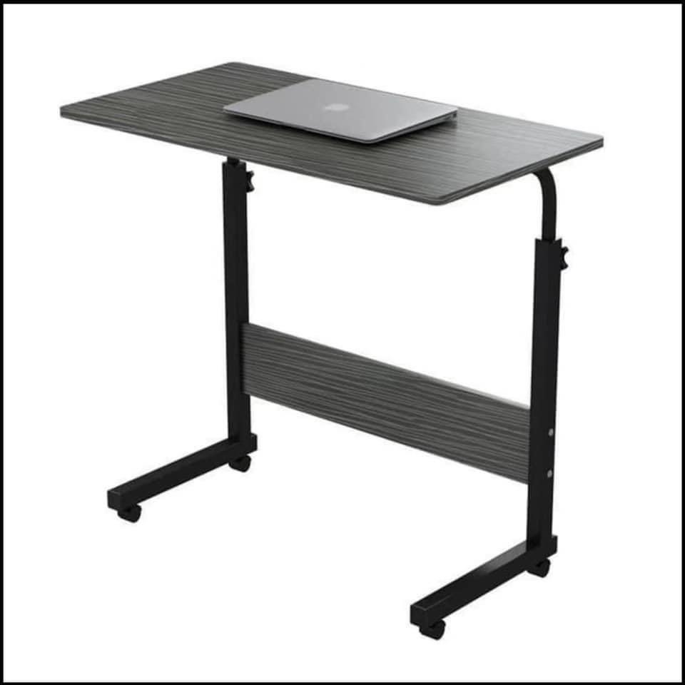 Portable Movable Adjustable Laptop Table Desk (Category: Tables & Sets) located in Manila. Submitted by borntoshop888_rechargeables (Listing ID 1024132686, Image 2). Description: 💕💕💕💕💕💕💕💕 Portable Adjustable Laptop Table Movable with wheels. You can use this table for anything and everything you do! It can be a game table, laptop table, dinner table, homework table, and so much more! Adjustable height for adults and children for studying,