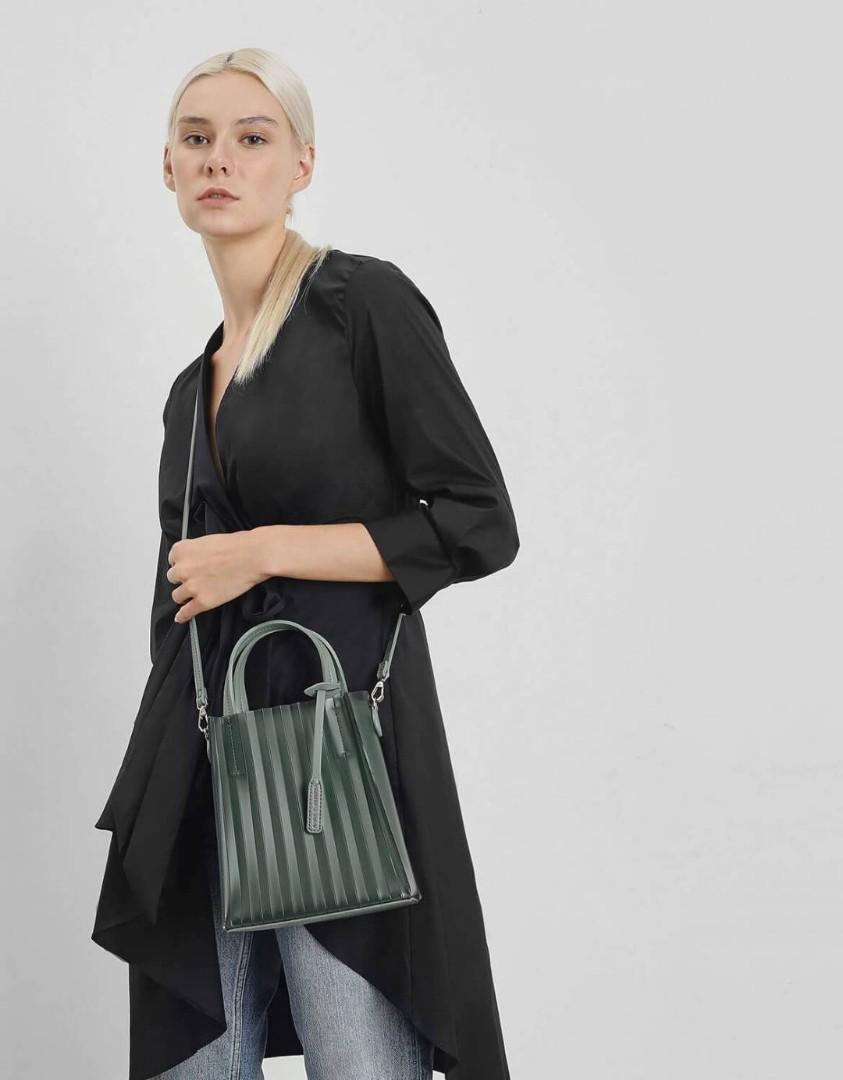 Guarantee authentic Translucent bag by Charles and Keith