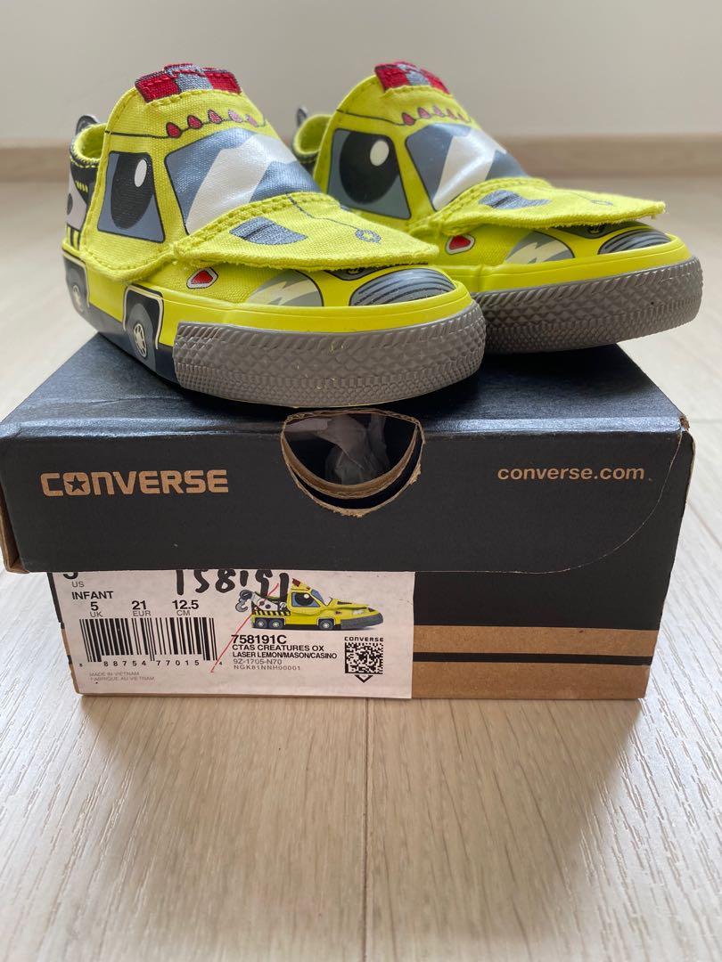 yellow infant converse
