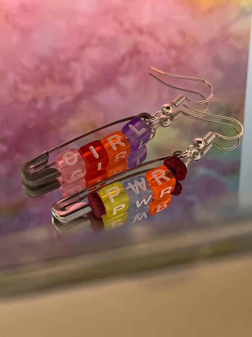 Girl on sale power earrings