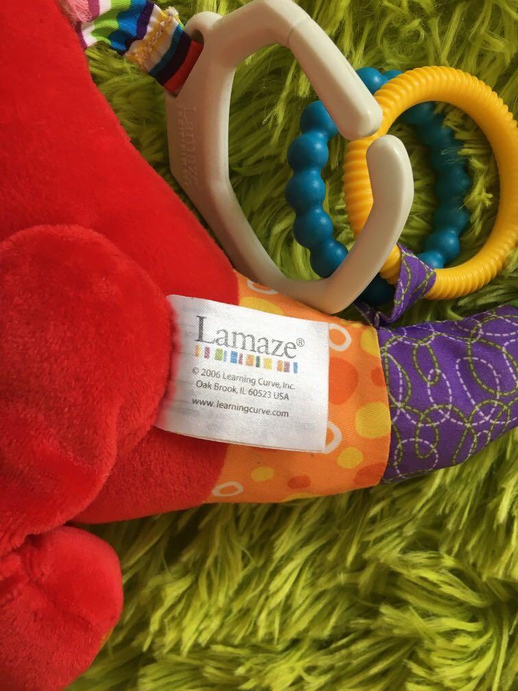 Lamaze stroller toy (Category: Infant Playtime) located in Lipa City. Submitted by abubotcorner (Listing ID 1024205469, Image 3). Description: Very good condition Small loose stitch that can easily be sewn Newly washed ‼️Price is final. Please refrain from making insulting offers. Let's not waste each other's time..