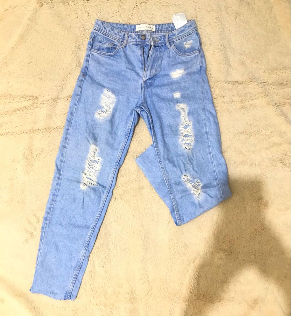 women's blue high waisted ripped jeans