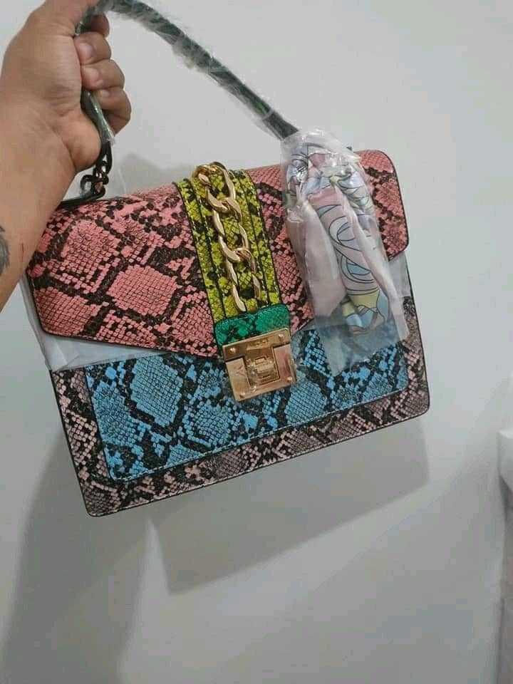 Aldo snakeskin sale clutch